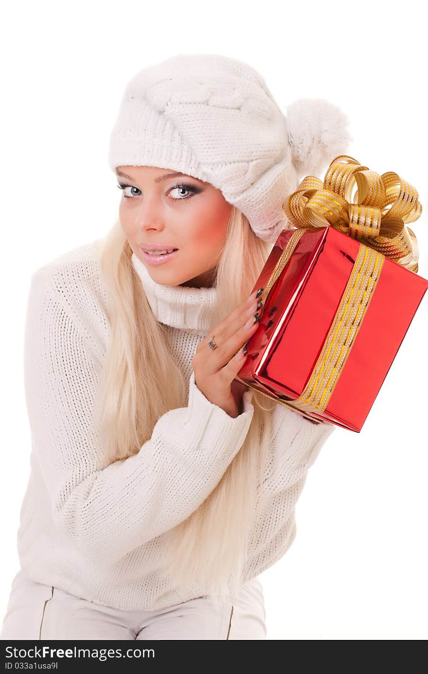 Girl holding a presents on white background