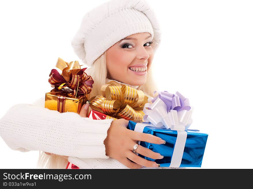 Girl holding a presents on white background. Girl holding a presents on white background