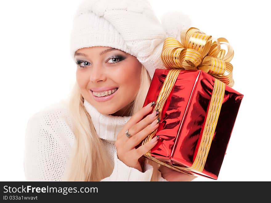 Girl holding a presents on white background. Girl holding a presents on white background