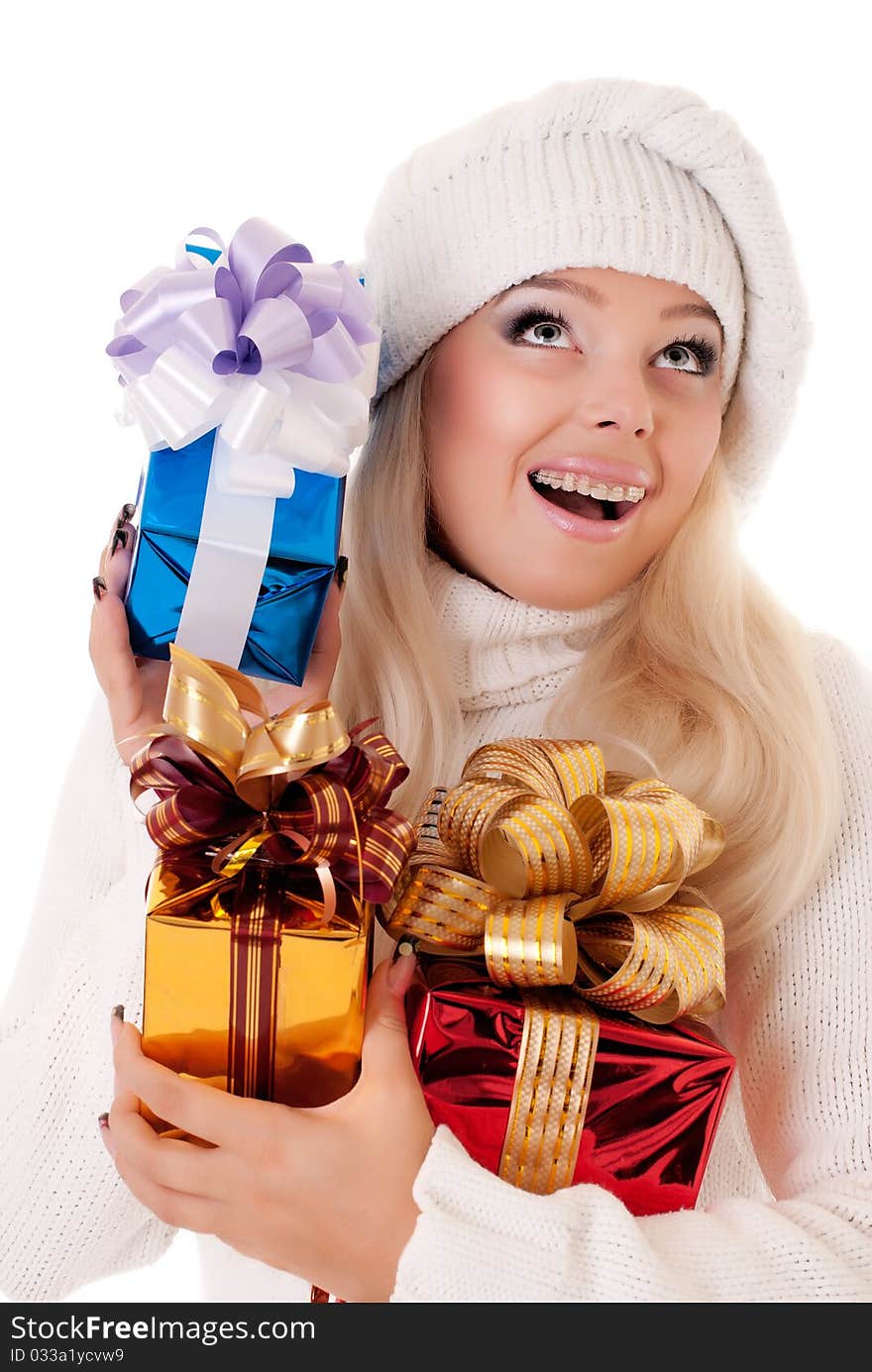 Girl holding a presents on white background. Girl holding a presents on white background