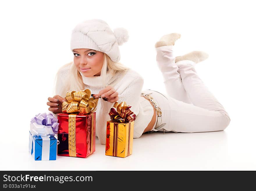 Girl holding a presents on white background