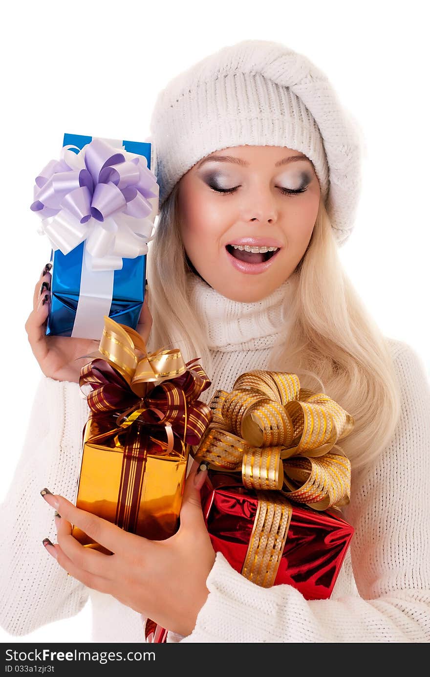 Girl holding a presents on white background. Girl holding a presents on white background