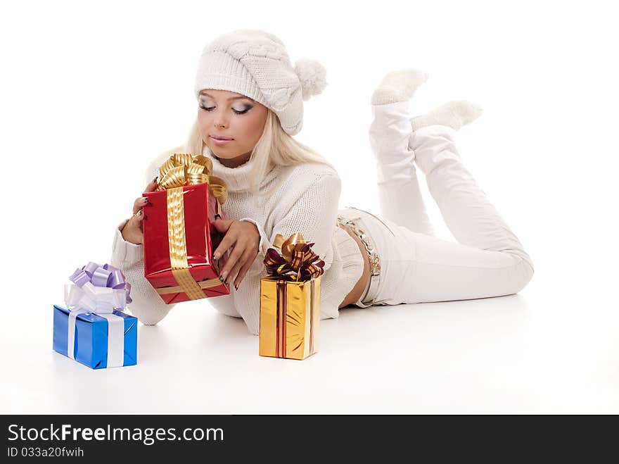 Girl holding a presents on white background. Girl holding a presents on white background