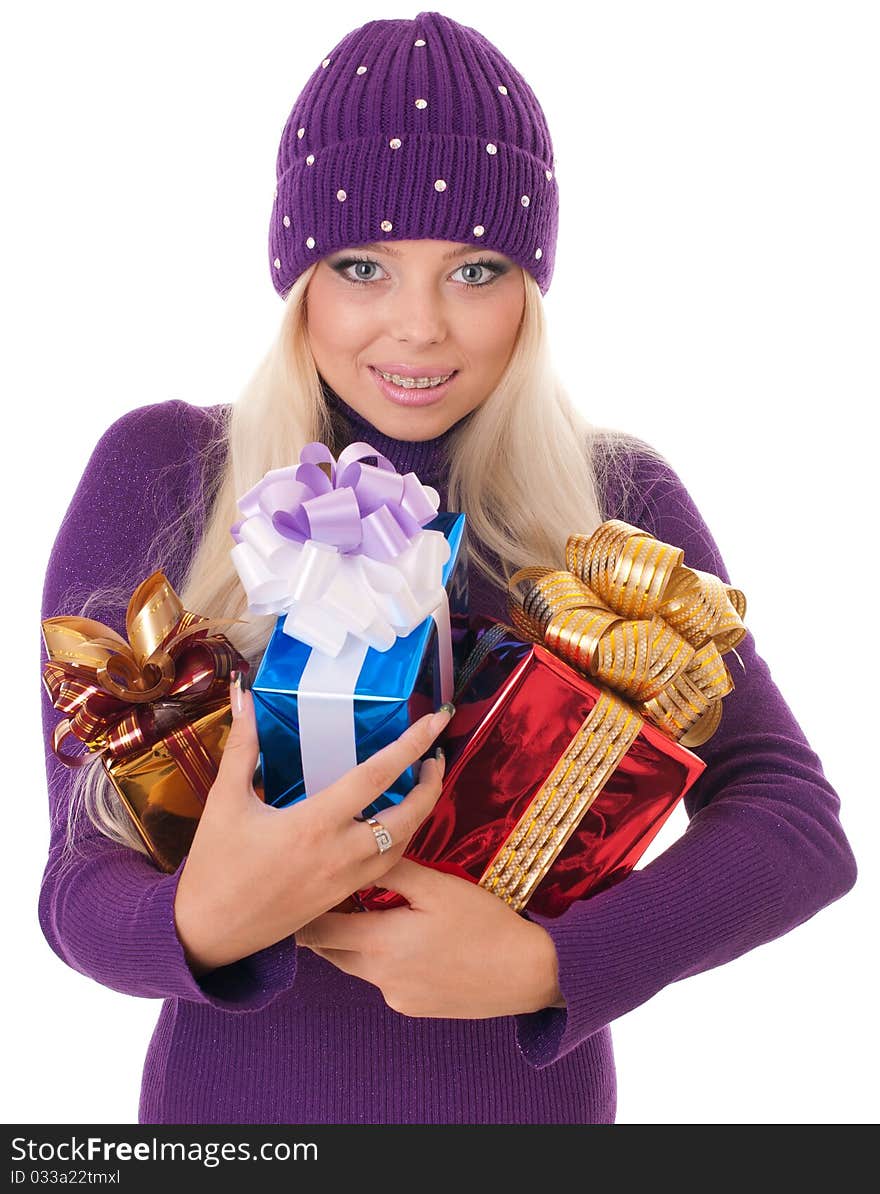 Girl holding a presents on white background