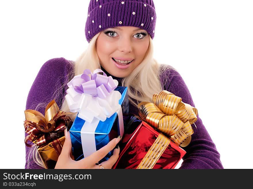 Girl holding a presents on white background. Girl holding a presents on white background