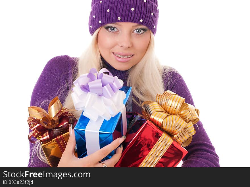 Girl holding a presents on white background. Girl holding a presents on white background