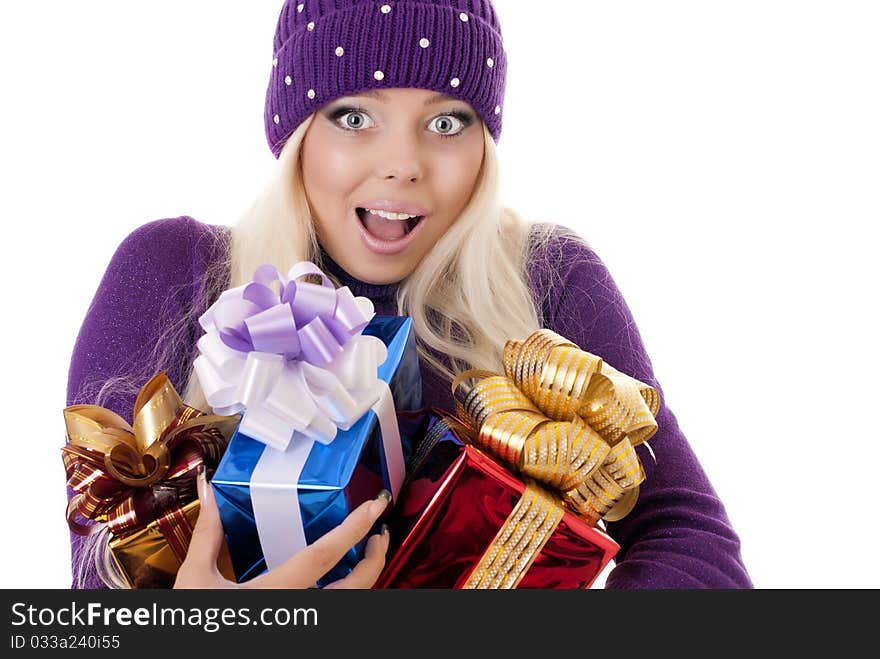 Girl holding a presents on white background