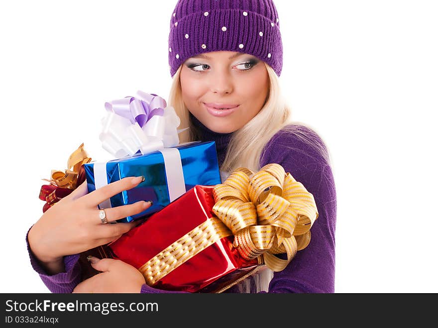 Girl holding a presents on white background. Girl holding a presents on white background