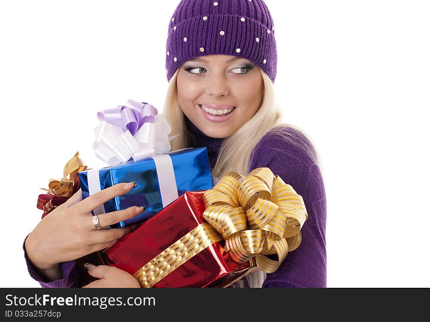 Girl holding a presents on white background. Girl holding a presents on white background