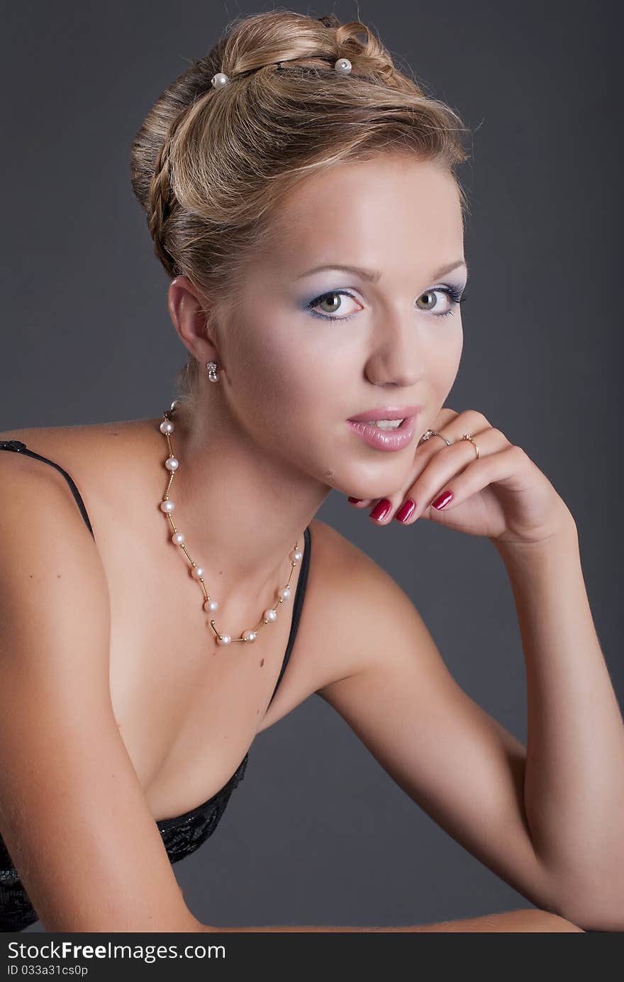 Studio portrait of a girl with fashion hair and makeup. Studio portrait of a girl with fashion hair and makeup