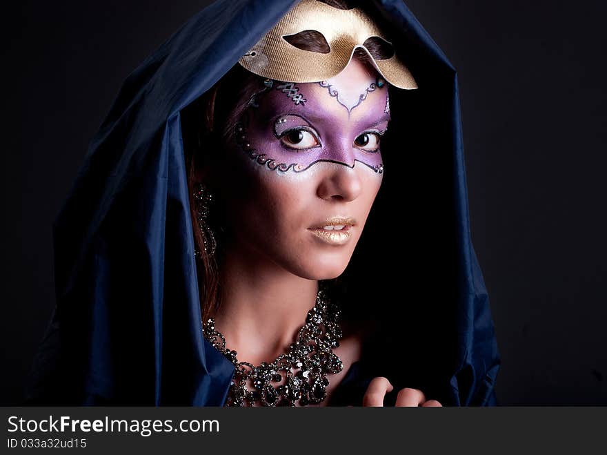 Studio portrait of a girl with art make-up. Studio portrait of a girl with art make-up