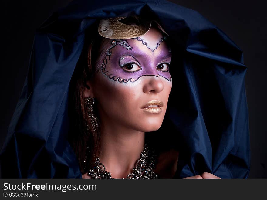 Studio portrait of a girl with art make-up