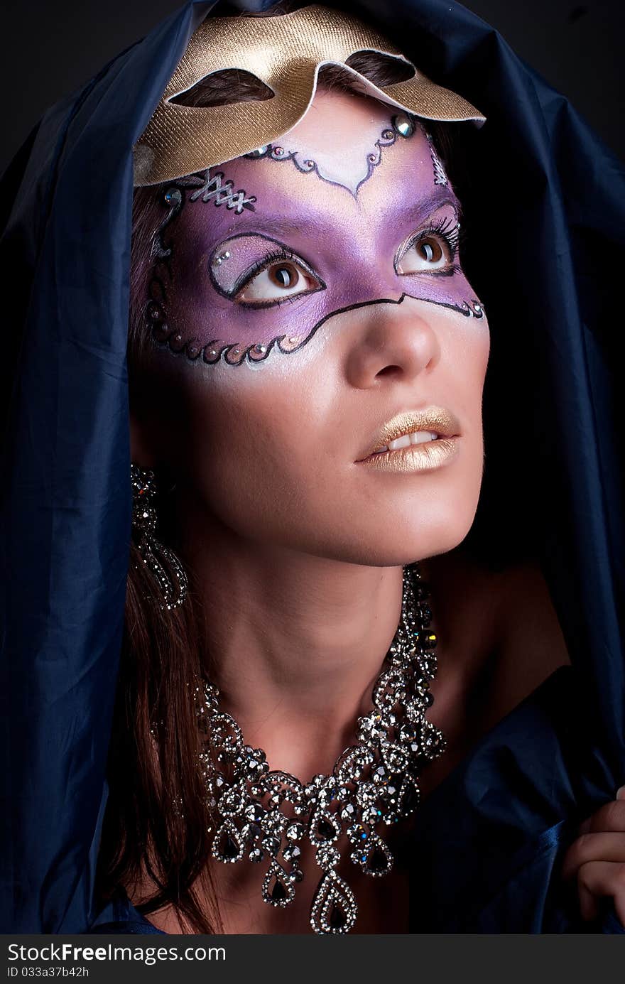 Studio portrait of a girl with art make-up