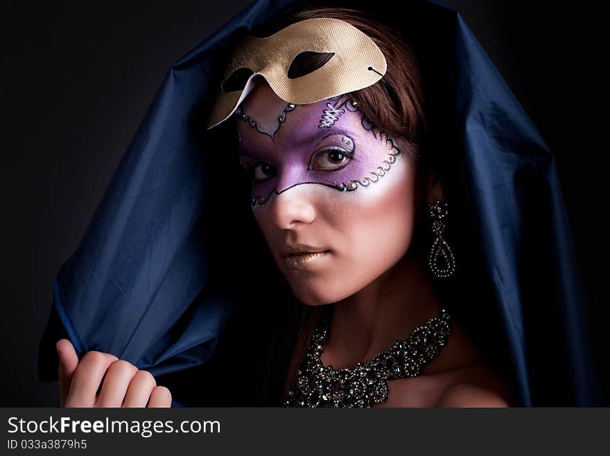 Studio portrait of a girl with art make-up