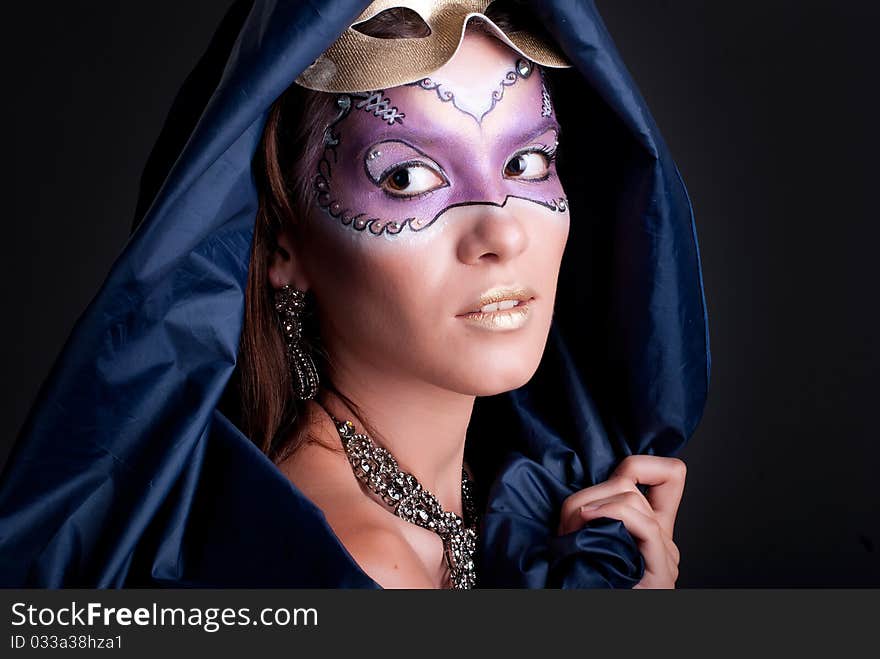 Studio portrait of a girl with art make-up