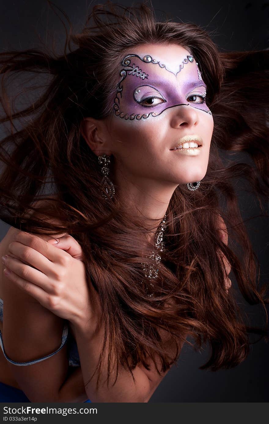 Studio portrait of a girl with art make-up