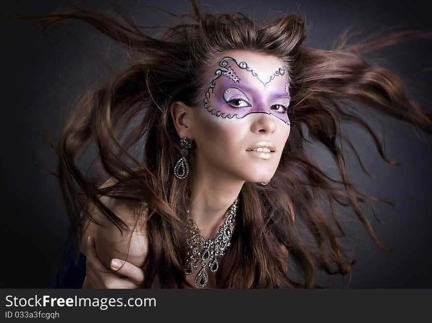 Studio portrait of a girl with art make-up