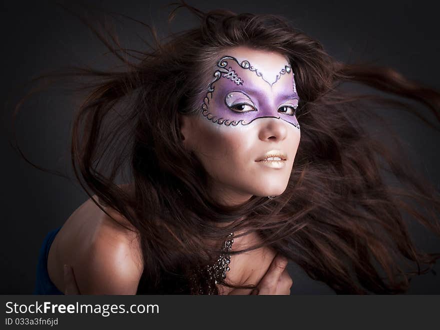 Studio portrait of a girl with art make-up