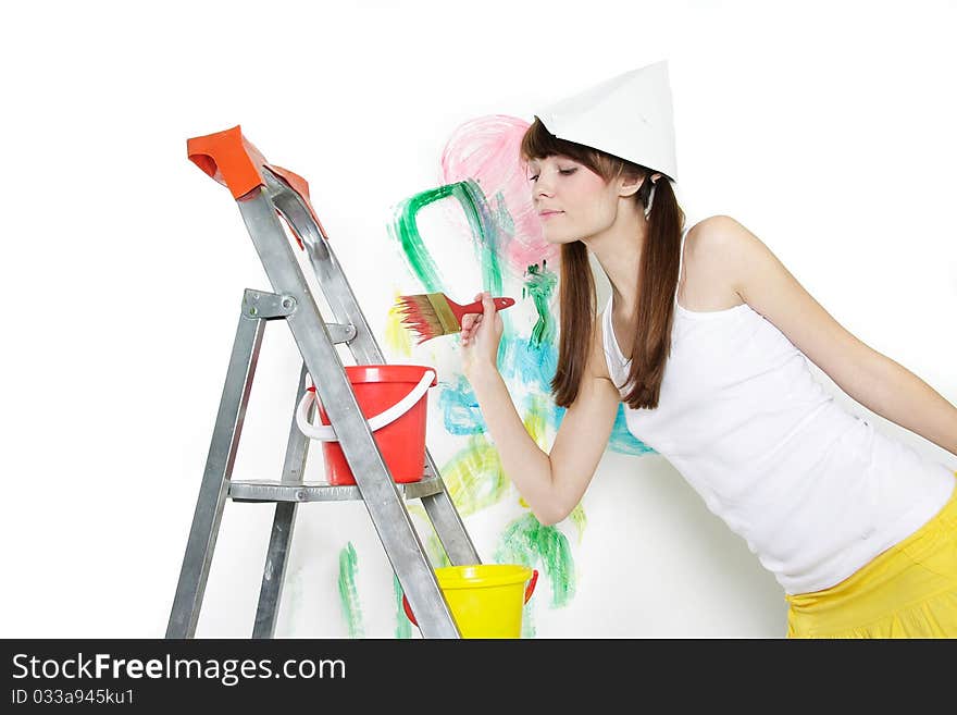 Young woman with paintbrush