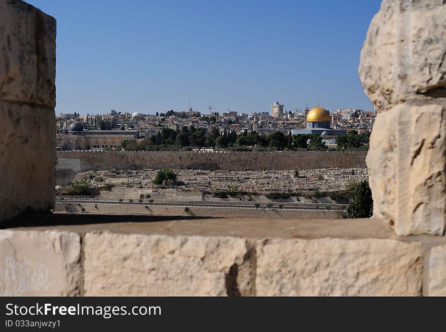 Glance through embrasure on Moria mosque Al Aqsa and Dome of the Rock. Glance through embrasure on Moria mosque Al Aqsa and Dome of the Rock