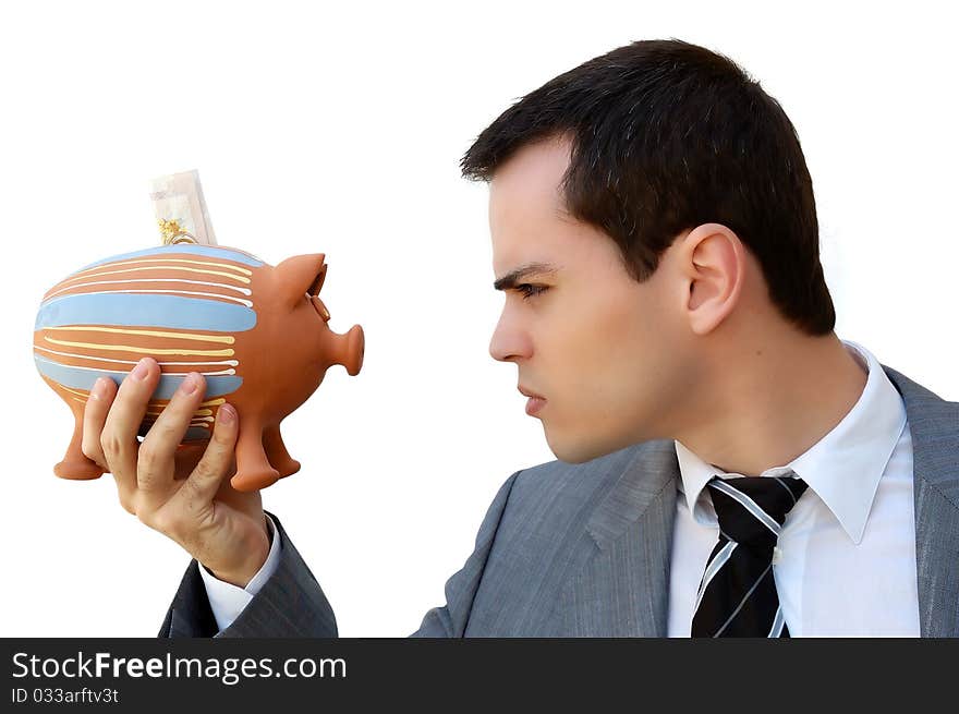 Businessman against the money pig