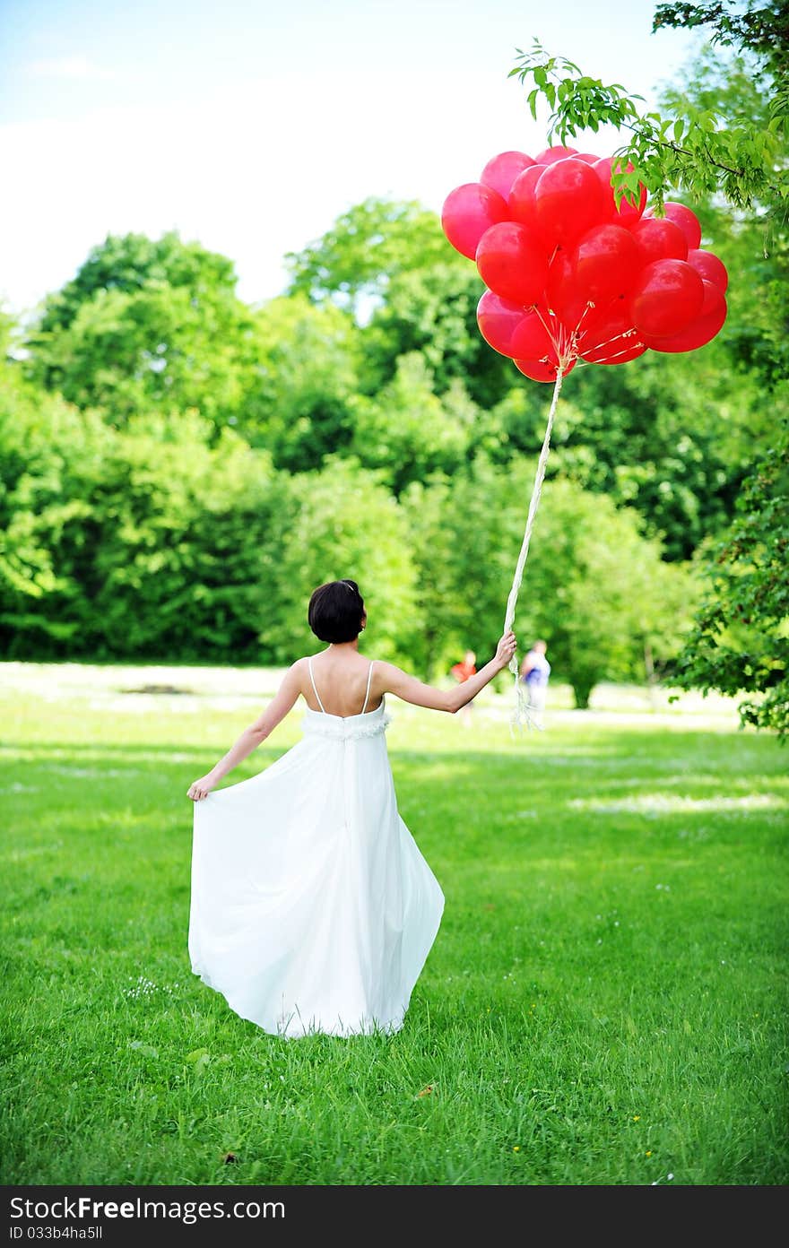 Bride and green field