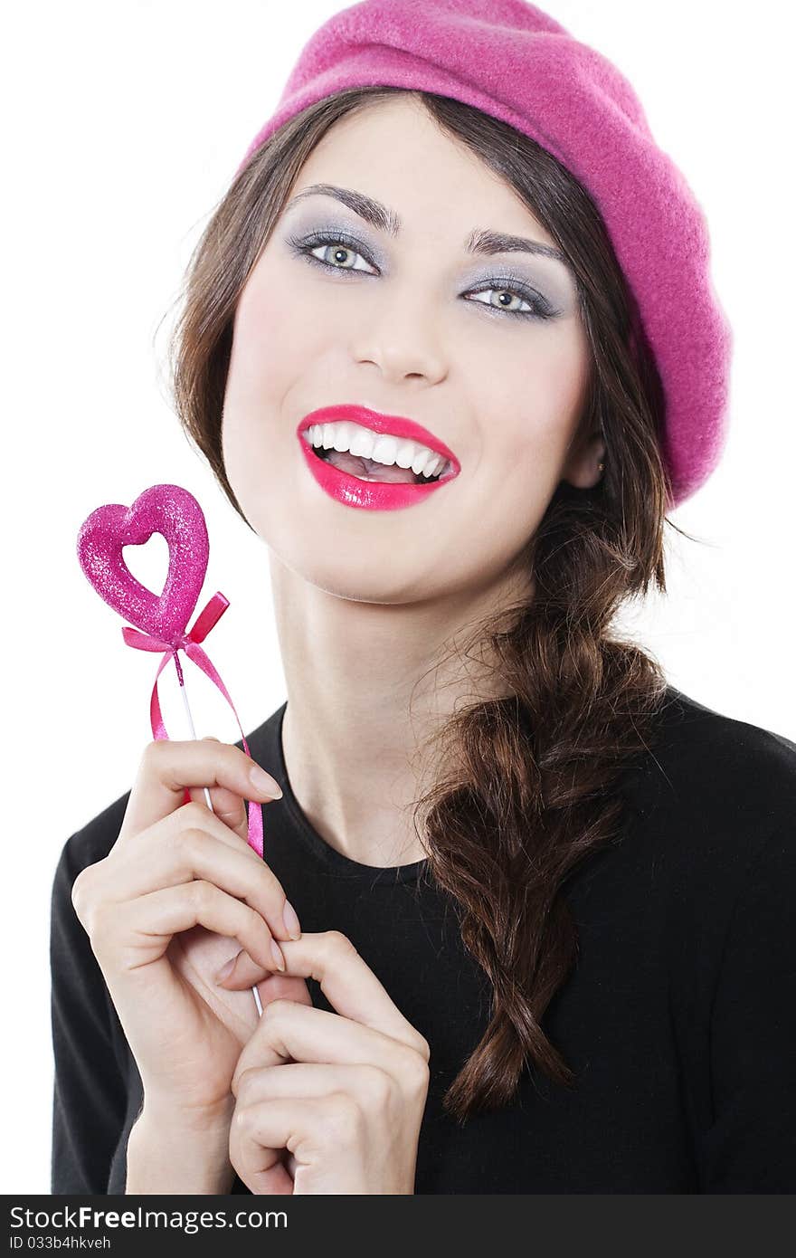 Beautiful smiling woman with heart on white background