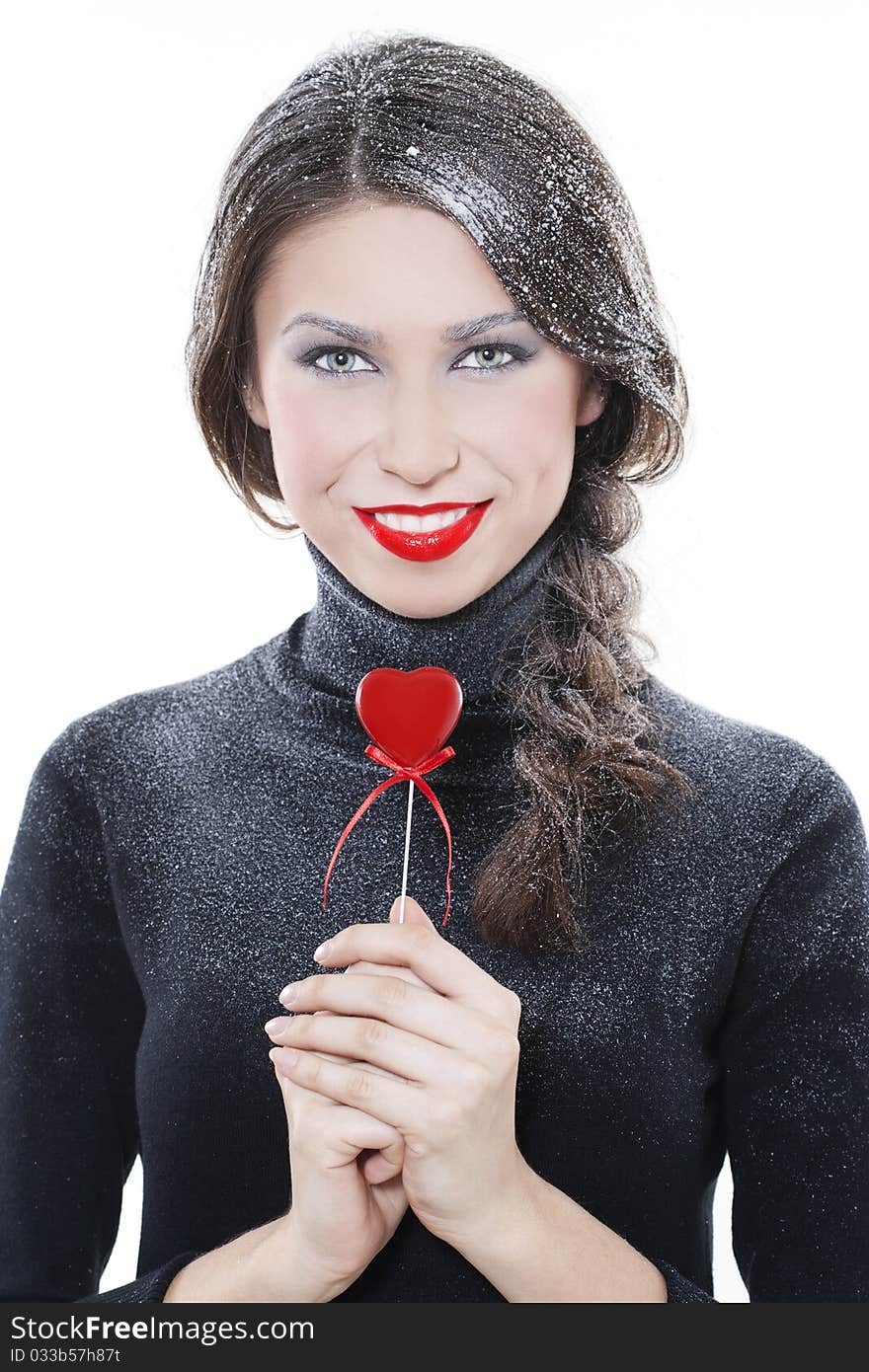 Beautiful smiling woman with heart on white background