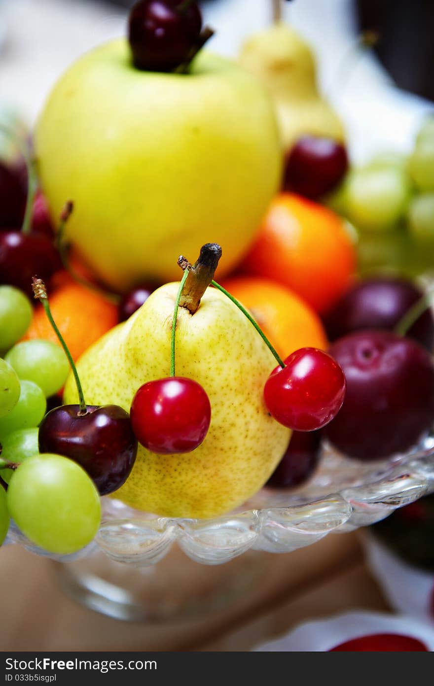 Fresh fruit on a festive platter on wedding table