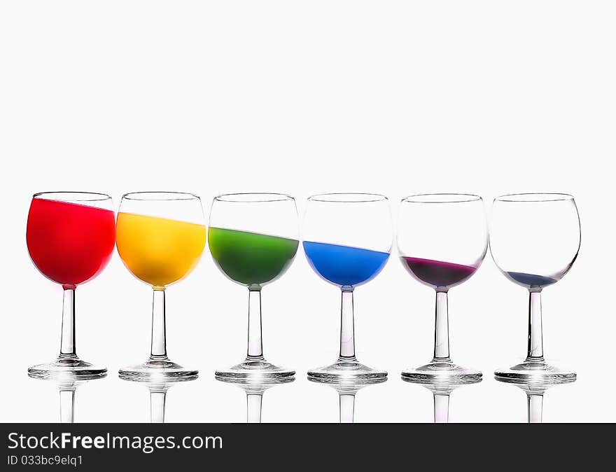 Six glasses with different color liquid. Six glasses with different color liquid