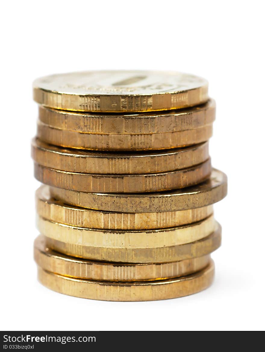 A stack of coins isolated on the white