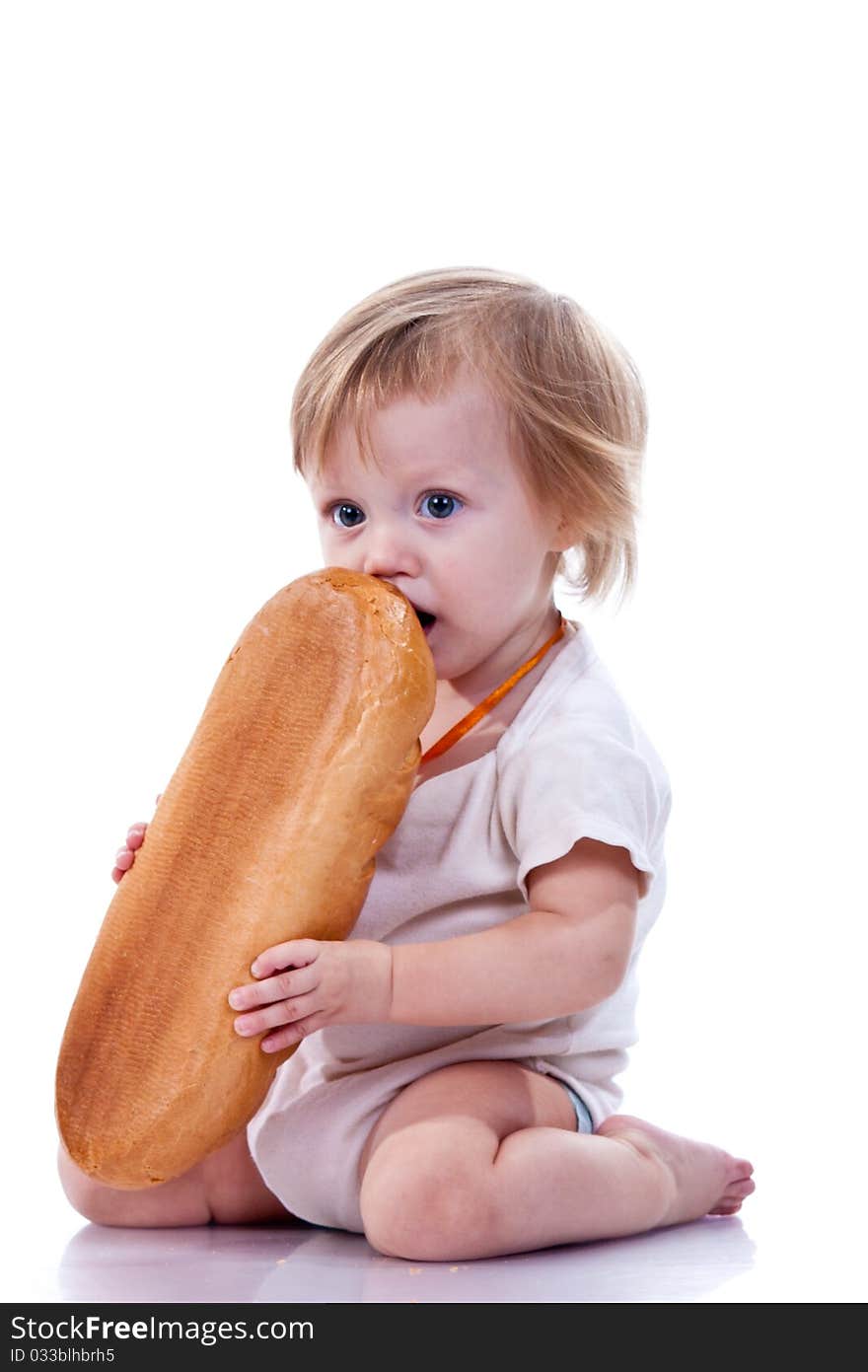 Baby holding a loaf of bread  isolated on white