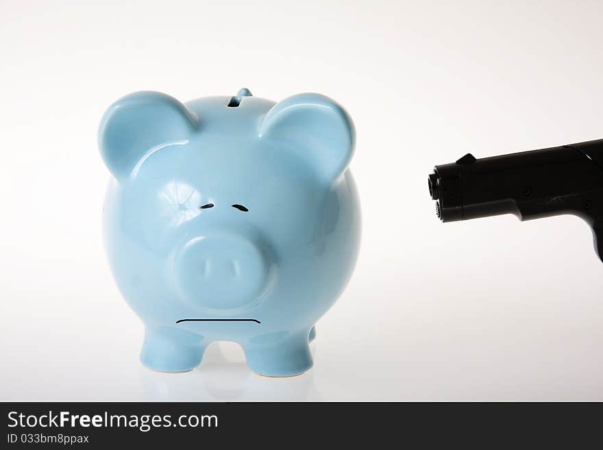 Blue piggy bank on white background being robbed. Blue piggy bank on white background being robbed