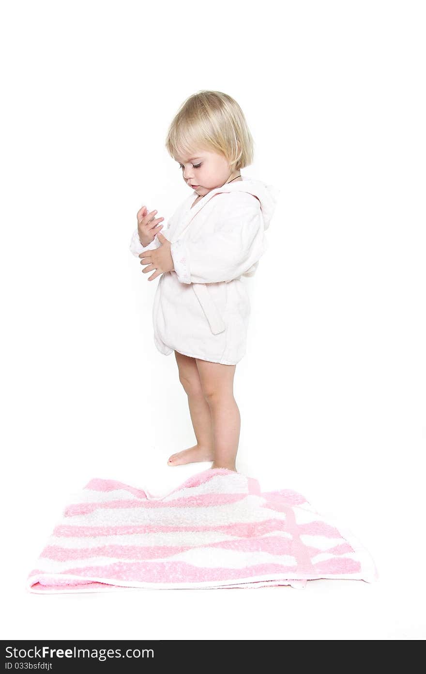 Studio portrait of cute girl after shower