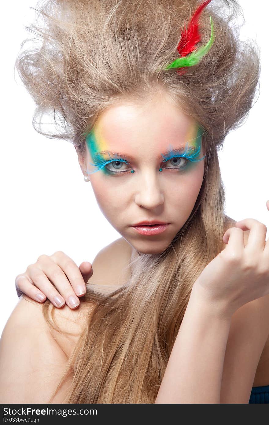 Beautiful woman  with color makeup over white background