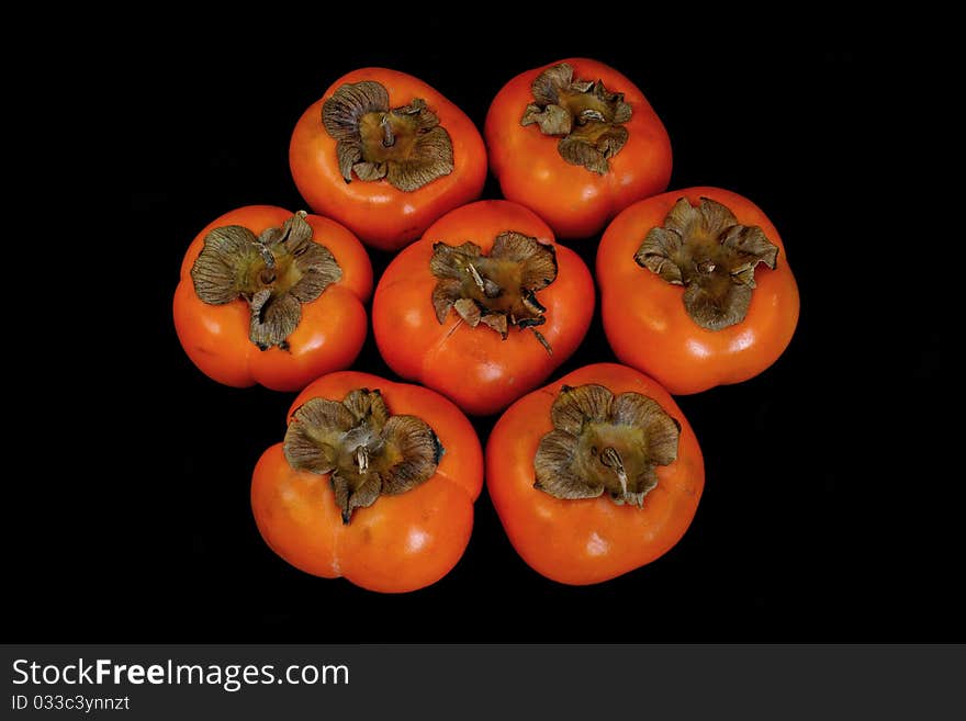 Fresh ripe persimmon isolated on white background. Fresh ripe persimmon isolated on white background