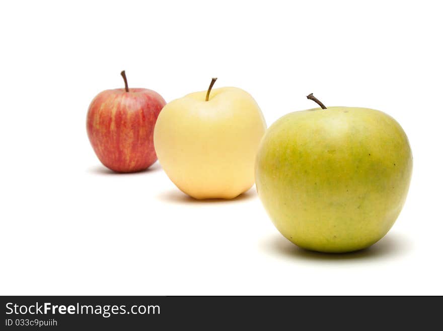 Rows of apples isolated on a white background. Rows of apples isolated on a white background