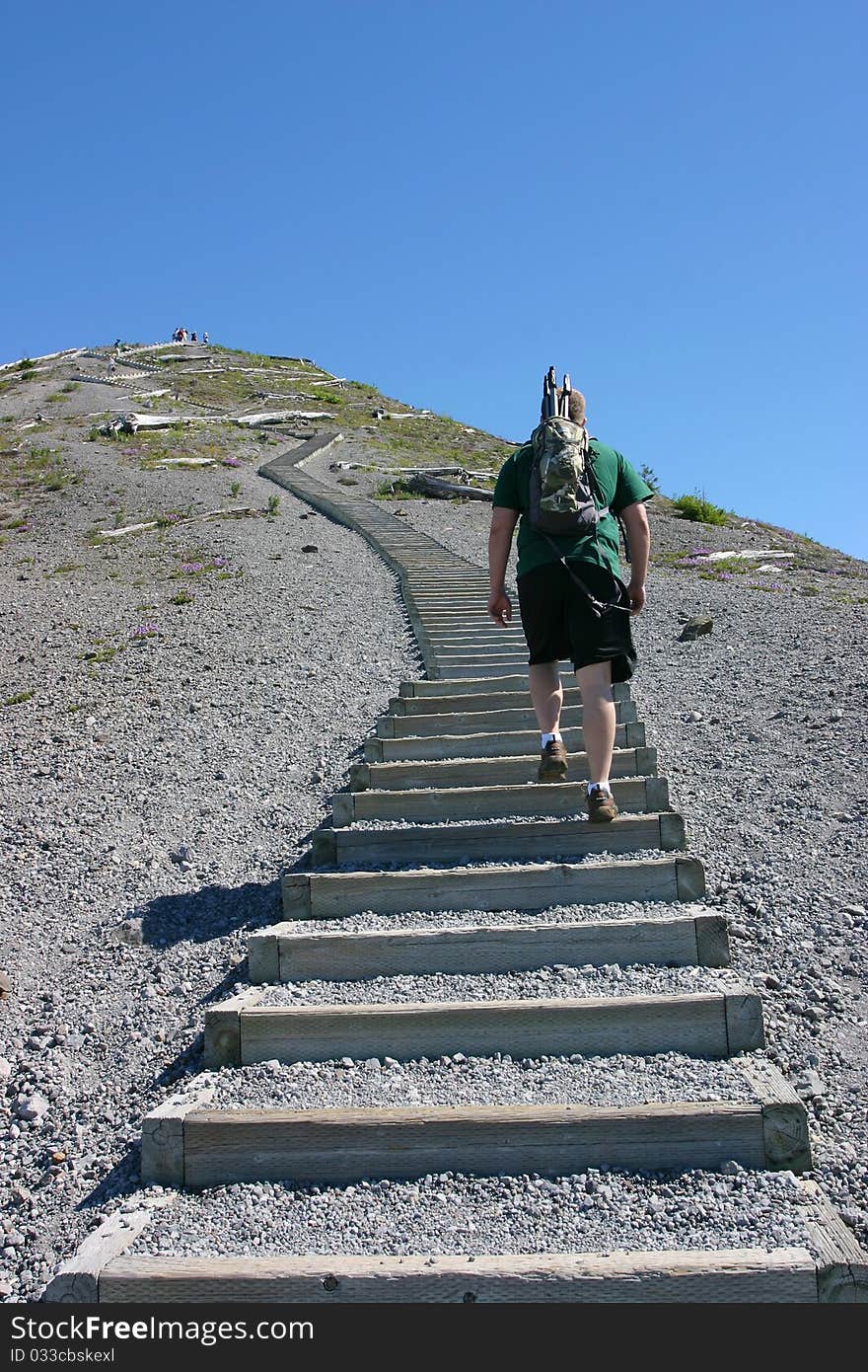 Man hiking up stairs at Mt St Helens. Man hiking up stairs at Mt St Helens