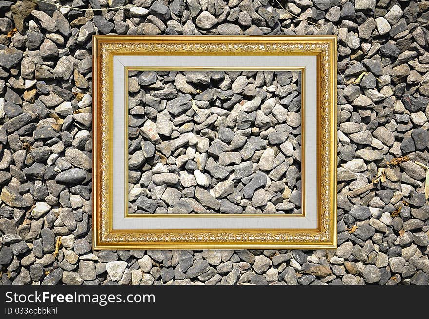 Golden Picture Frame on Stone texture