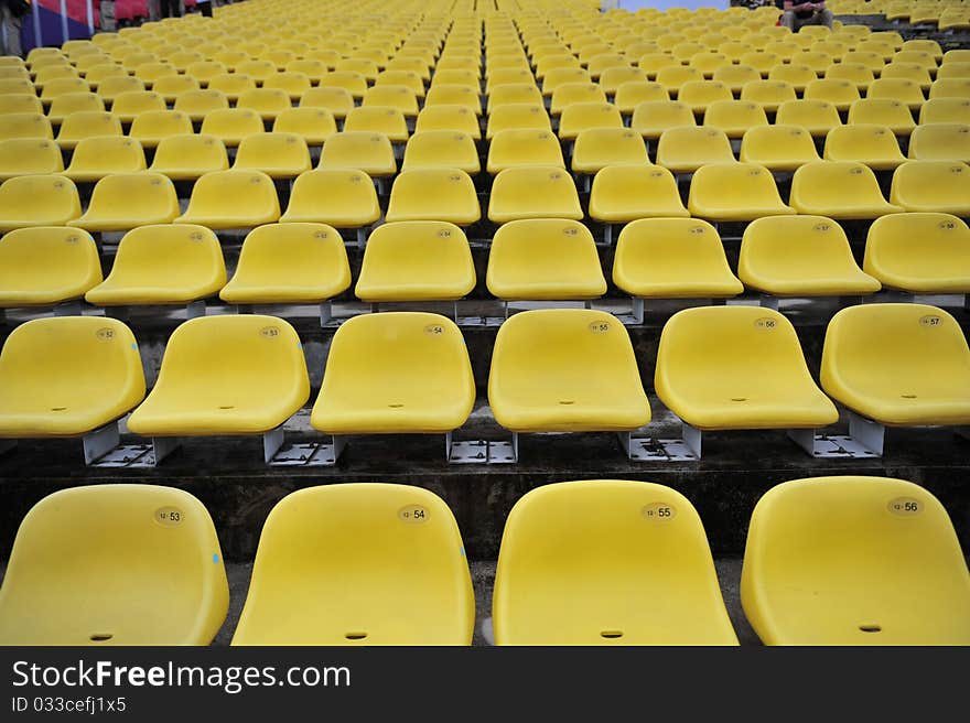 Yellow plastic chair