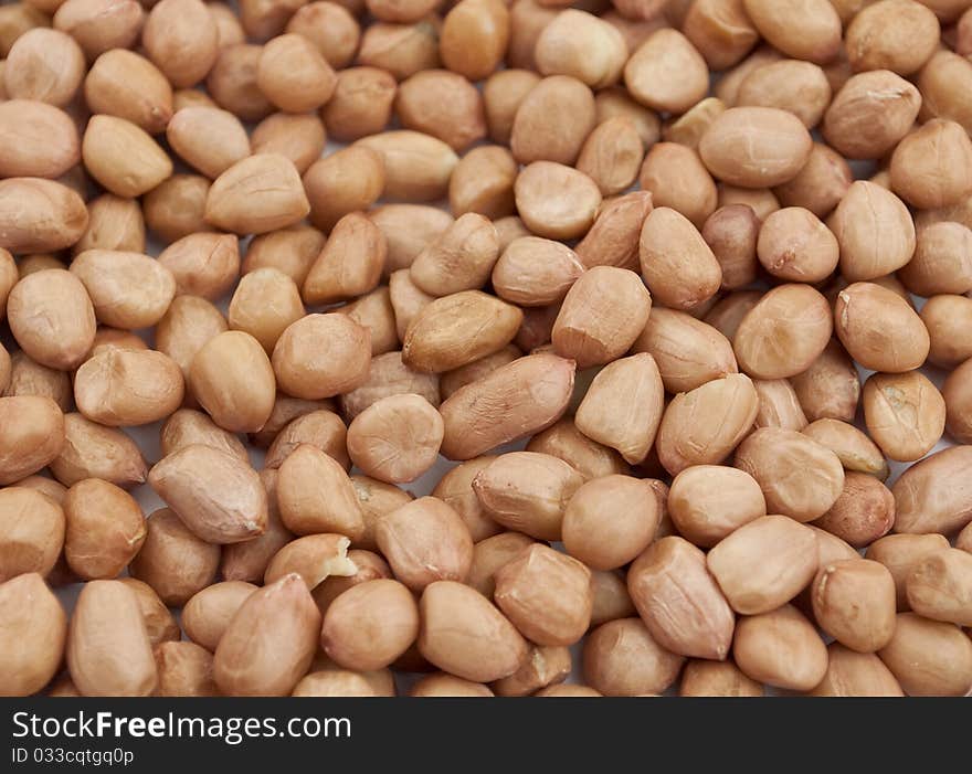 Brown peanuts texture, backgrounds closeup