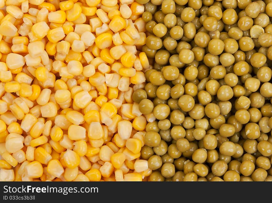 Yellow corn and green beans are stacked background