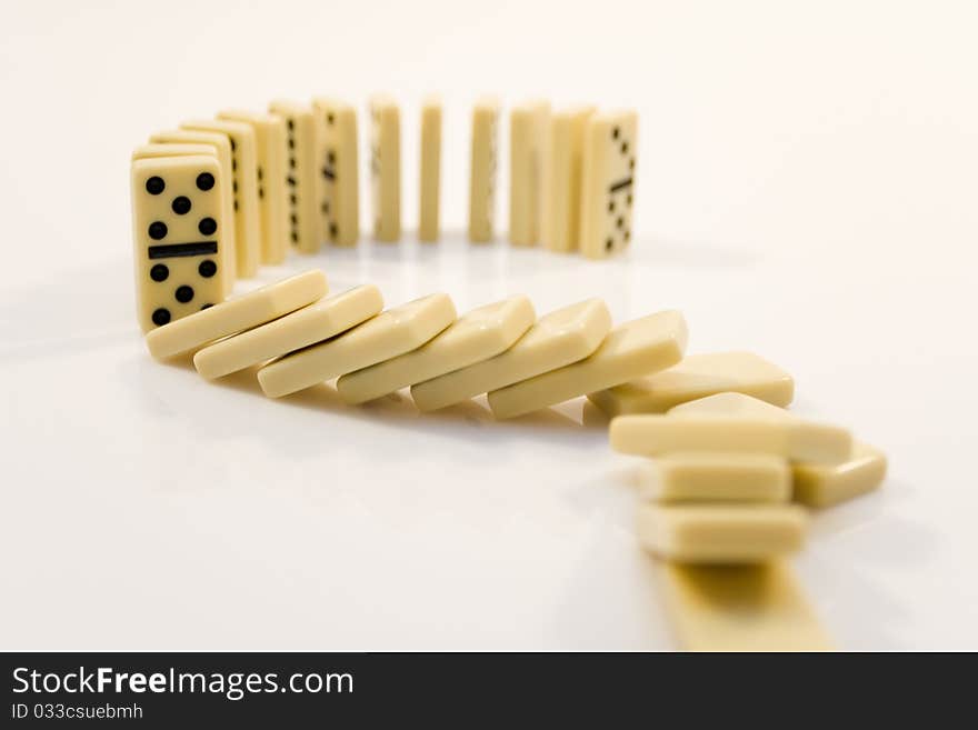 Domino-laying bricks on white background. Domino-laying bricks on white background