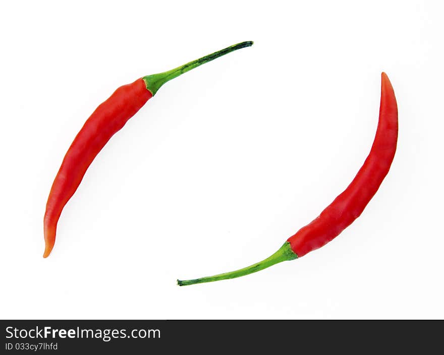 Two chili paprika rounded as recycle sign. Two chili paprika rounded as recycle sign