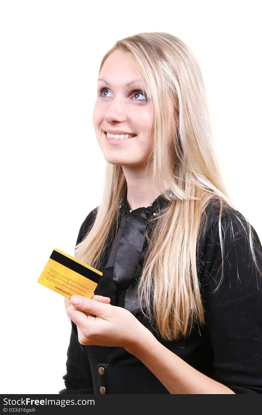 woman thinking about shopping holding credit card in the hand