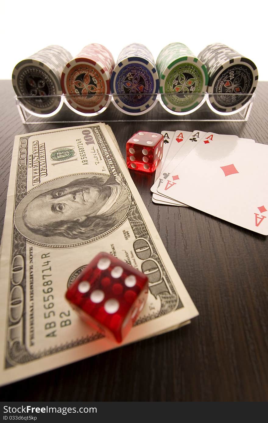 Red casino dice, pile of poker chips and poker cards. Red casino dice, pile of poker chips and poker cards