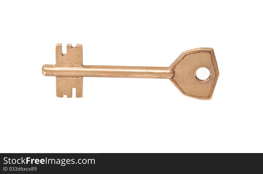 Old yellow key on a white background