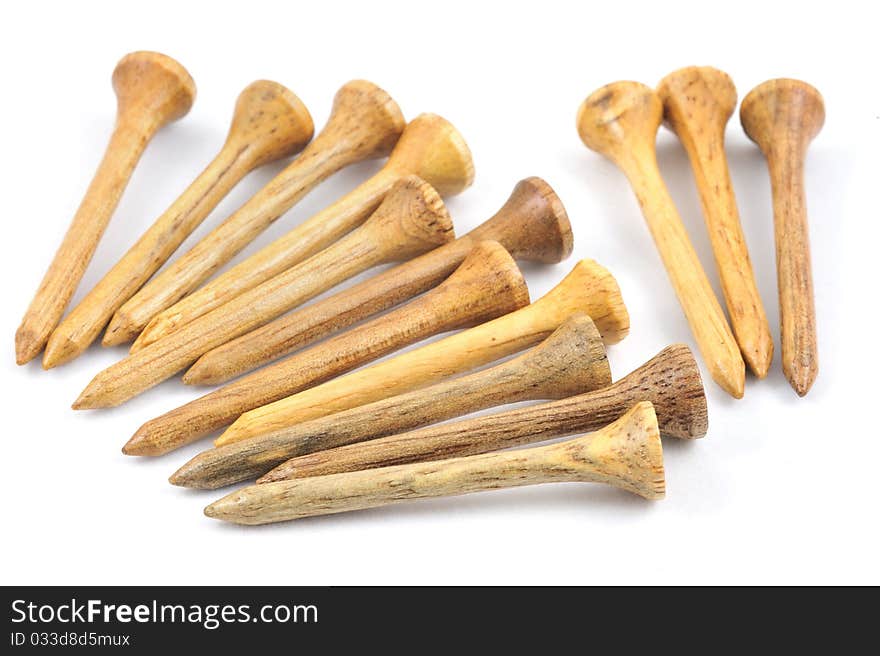 Wooden Golf Tee on white background