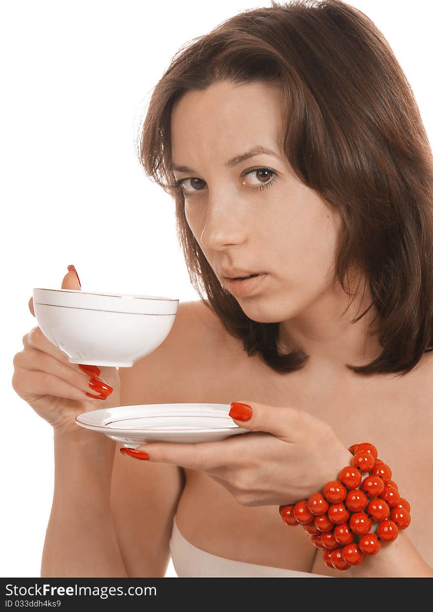 Girl with a cup in a red beads