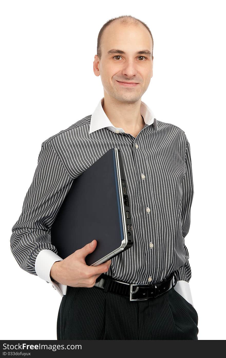 Young man holding a laptop over white background